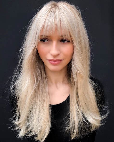 long blonde hair with bangs|woman super long blonde hair.